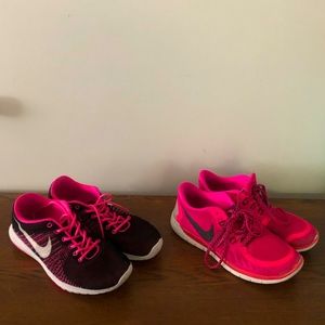 Two pairs of Pink youth Nike 6.5Y US